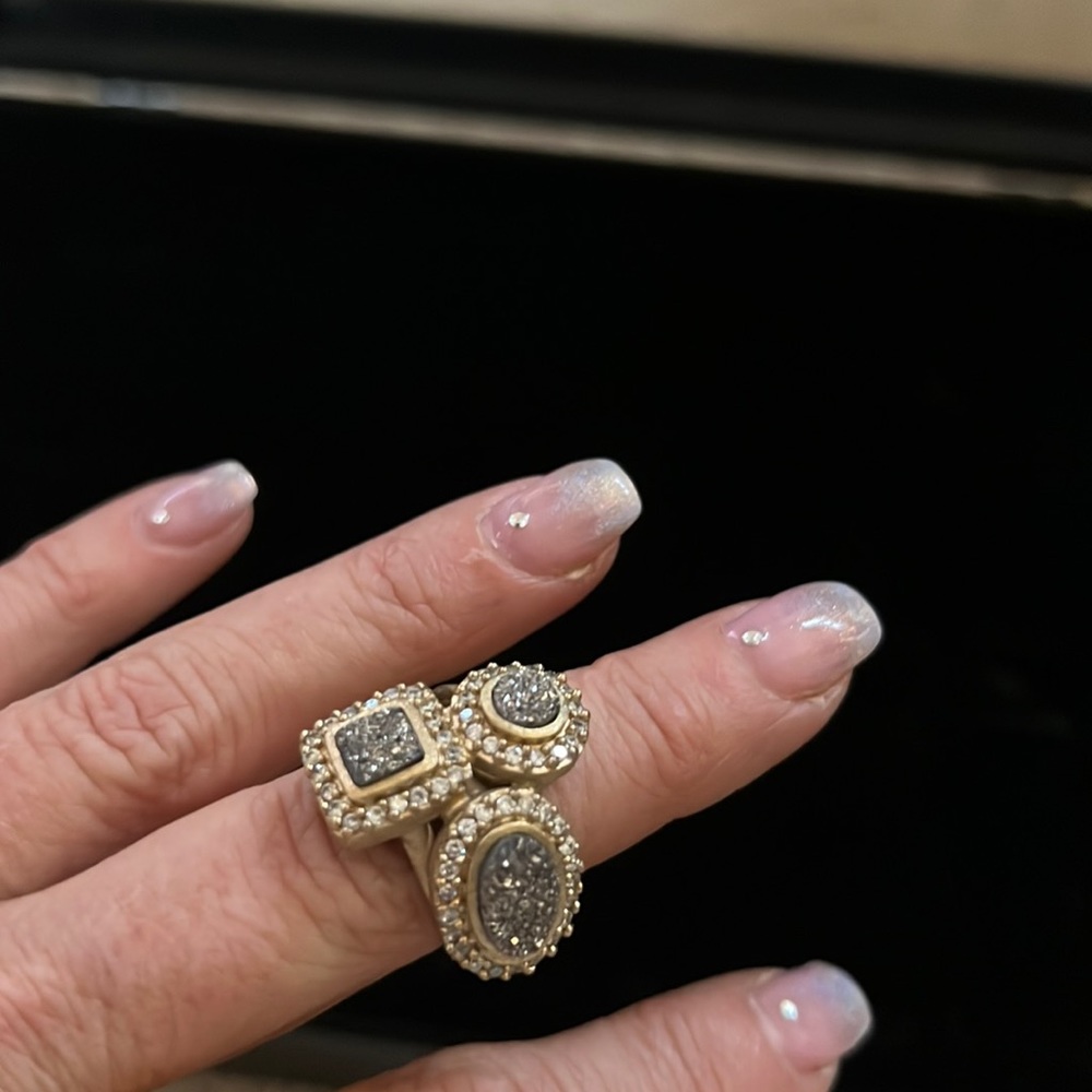 gold and gunmetal geometric silver ring  covered in crystals and crushed stones